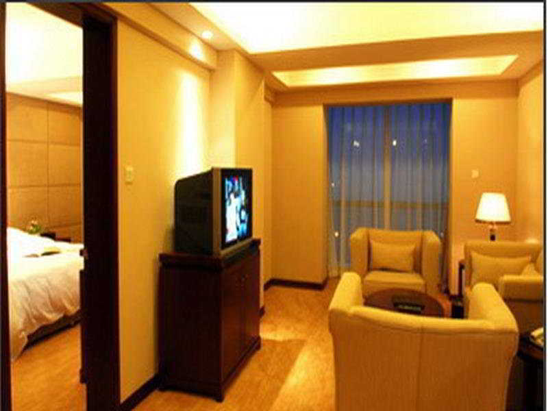 Delight Hotel Dalian Habitación foto